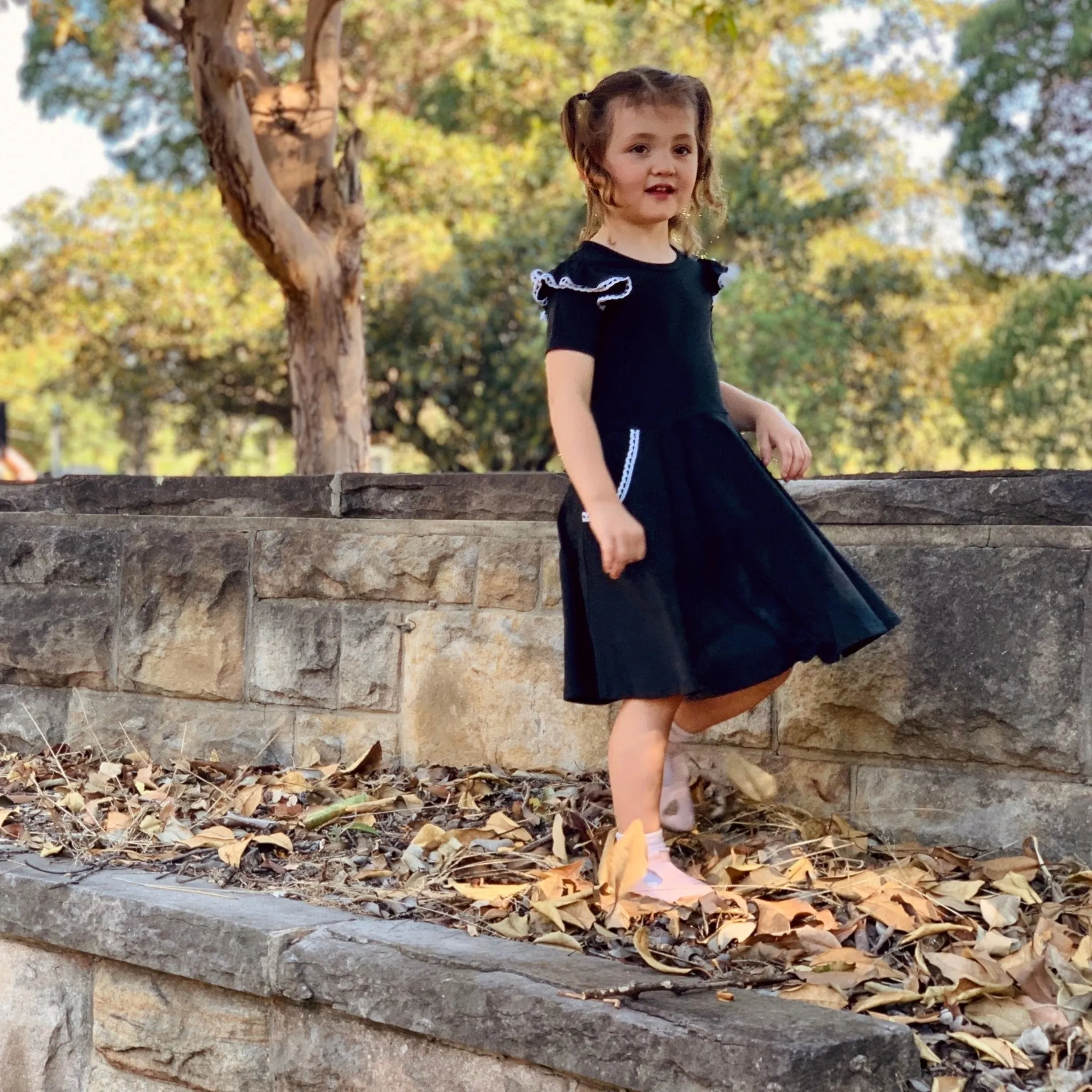 BLACK TWIRLY GIRL DRESS
